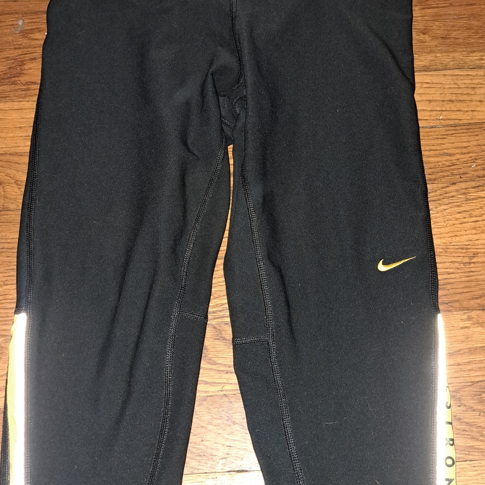 Nike Black Bike Shorts with Gold Swoosh